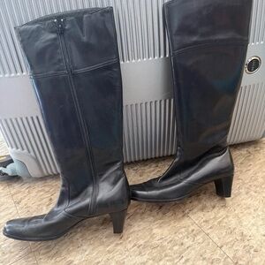Sleek Black Leather Heeled Boots